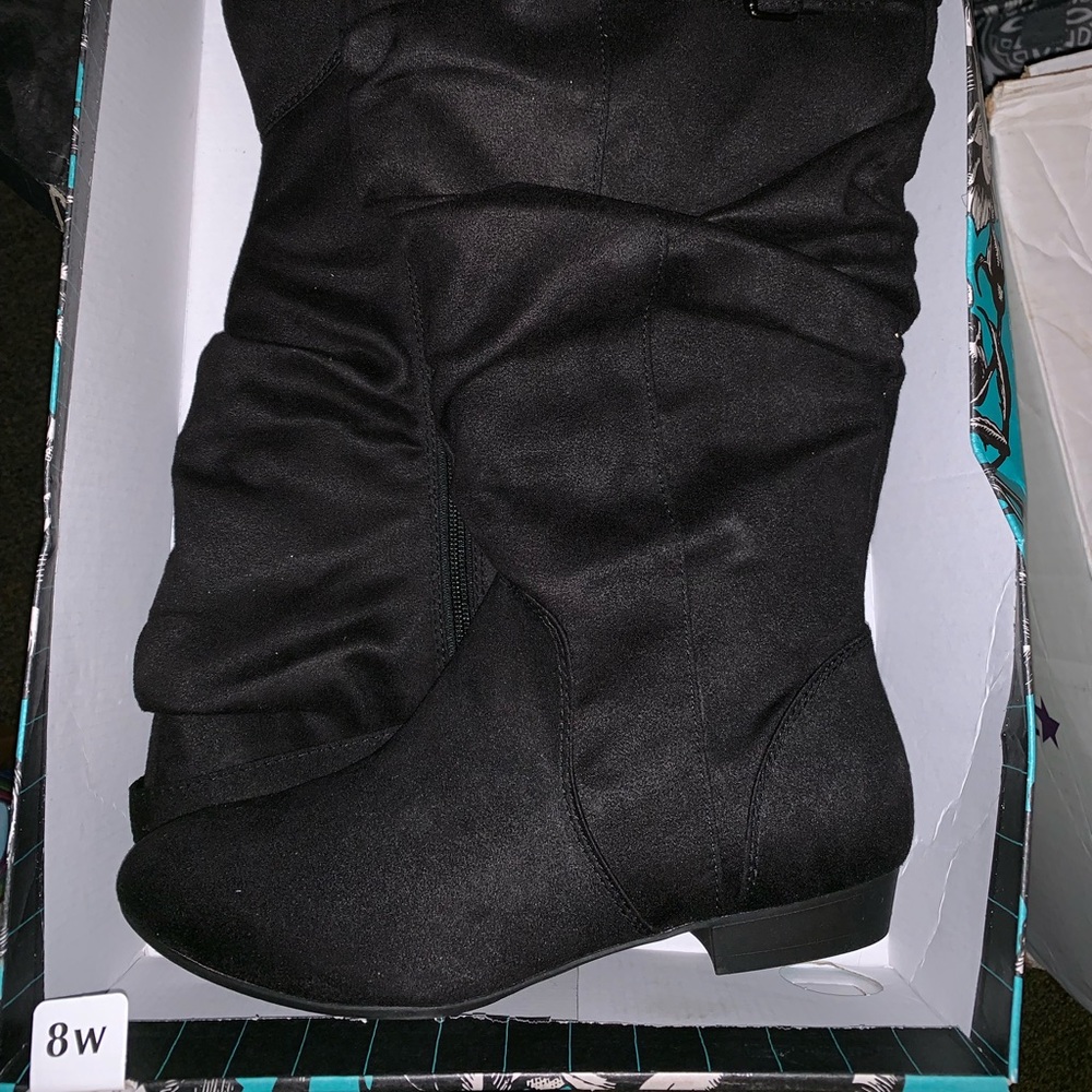 Lower East Side Raven Boots.
